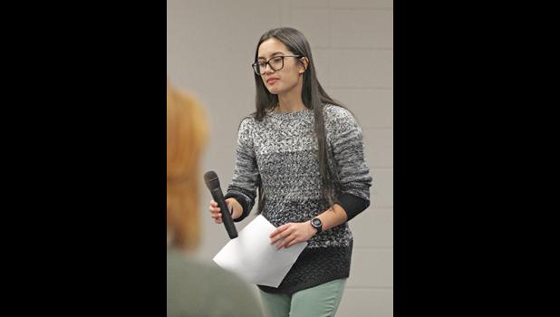 HIGH SCHOOL STUDENT Michelle Johnson  (right) — along with three other fellow classmates — gave impassioned speeches during Tuesday’s school board meeting to show their support for the new school policy in regards to dress. (Photo by Bill Morgan).