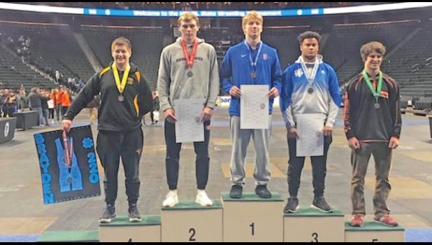 BRAYDEN WEBER IS HONORED on the podium for his 6th place win, even though he wasn’t able to be there himself. (Submitted Photo)