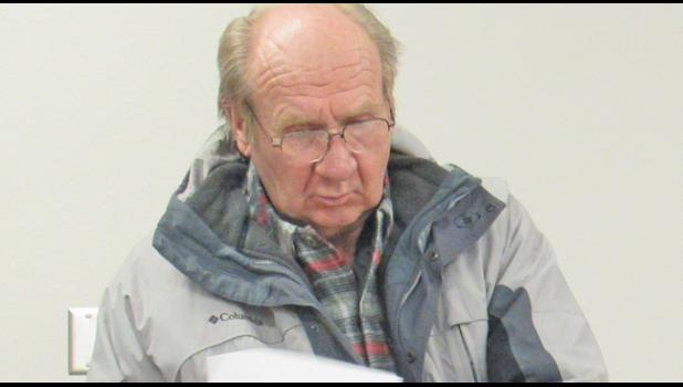 SUPERVISOR DAVE JEHOICH gives the board the road update during the Santiago Twp. Meeting Wednesday night. (Photo by Penny Leuthard)