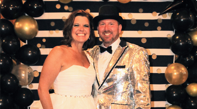 Jesse and Matt O’Neil pose for photos in their shiny garb. (Submitted Photo).