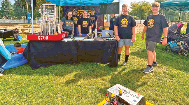 MEMBERS OF THE BIG LAKE ROBOTICS TEAM had demonstrations of their Spudnic Robot at the Block Party Saturday. (Submitted Photo).