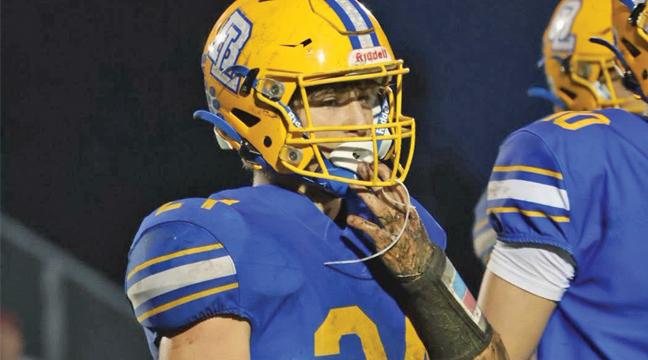 BIG LAKE RB Carter Stromberg amassed 61 yards total through the air and on the ground in the Hornet’s 48-6 loss to the Orono Spartans last Friday at home. (Submitted Photo by Jessica LaRoche).