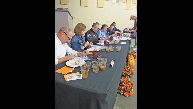 LOCAL “CELEBRITY” JUDGES, Mark Graham, Tracy Bertram, Brent Baloun, Dale Christensen, Kent Graning and Nate Bucher had their work cut out for them in determining the winners of the chili and dessert competitions. (Photos by Penny Leuthard)