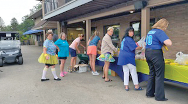 THE DAY started off with golfers being served breakfast just outside the clubhouse. (Submitted Photo).