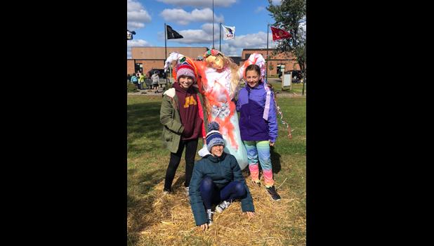 Lauren G., Weslie S. and Ellie E. created a uniquely beautiful scarecrow for their creation. (Submitted Photos)