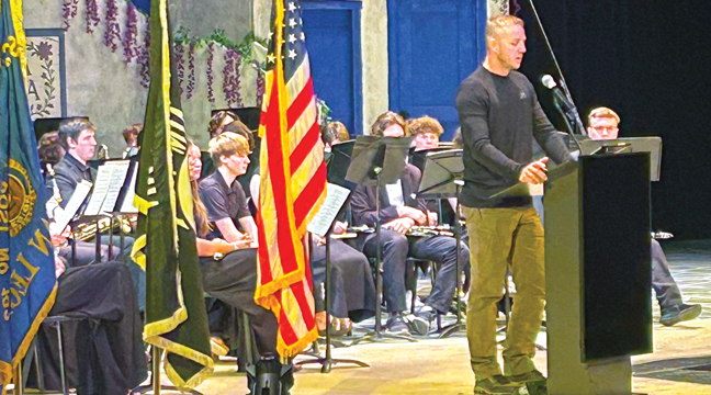 Staff Sergeant Caleb Hansen was the featured speaker at this year‘s Becker Schools Veterans Day celebrations. The 2006 Becker high school graduate is also a current Becker police officer. (Submitted Photo).