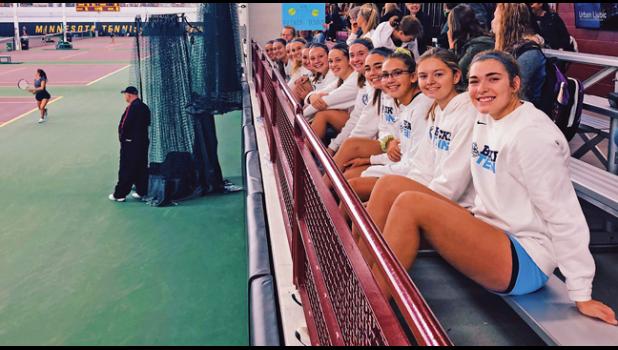 THE GIRLS TENNIS TEAM exuded excitement and good spirits as they soaked up their time at the University of Minnesota’s Tennis Center at the state tournament. (Submitted Photo)