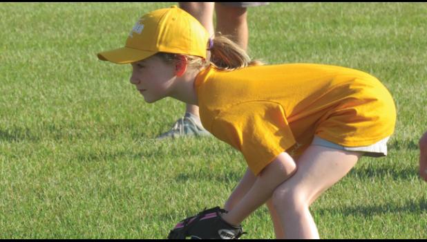 ANIKA PETROSKE is all business as she prepares for the next ball that comes her way during Palmer Ball in July. (Photo by Penny Leuthard)