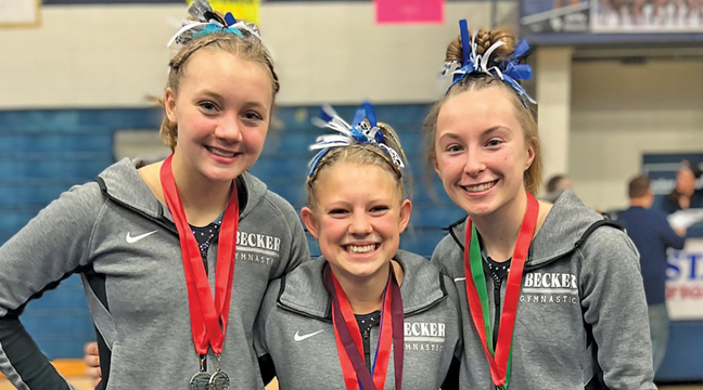 The Becker gymnastics team was well-represented at the State Class A Gymnastics Meet this year, as three individuals participated for the Bulldogs.  Pictured, from left, Lauren Woelfel, Riley Norberg and Emma Hennessey. (Submitted photo.)