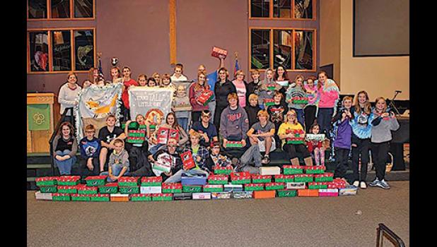 REJOICE LUTHERAN CHURCH YOUTH and their leaders packed 69 Operation Christmas Child boxes and made six tie blankets for the Wright Co. Crisis Nursery. (Submitted Photo)