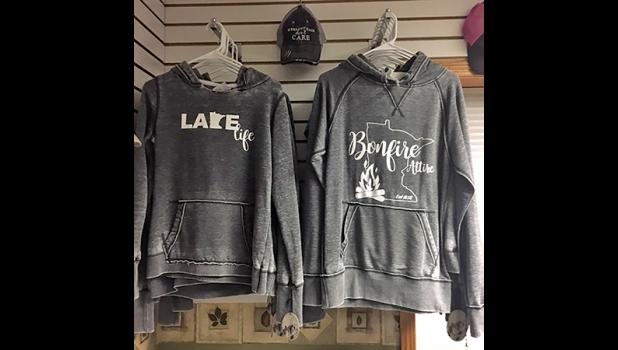MAJESTIC CREATIONS has great gift items including cribbage boards, mittens, hats, cutting boards and sweatshirts (above). (Submitted Photo).