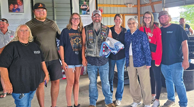 CLEARWATER VETERAN CYLE PAUMEN surrounded by members of his family. (L to R) Sister Kathy Kuhn, daughter Cayla’s boyfriend Mathew Kiess, daughter Cayla Paumen, Cyle Paumen, wife Jennifer, mom Lila Paumen, daughter Cassidy Paumen, and her boyfriend Bryce Kuschel. (Submitted Photo).