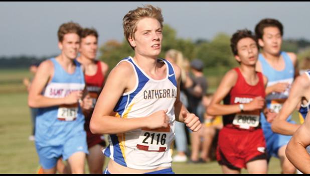ST. CLOUD CATHEDRAL’S MITCH MILLER races toward the finish line during a cross country meet this season. (Submitted Photo)