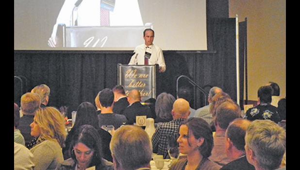 CentraCare Health - Monticello Co-Administrator Brian Bauck talks about the community during the annual benefit breakfast at River City Extreme in Monticello last week. (Photo by Ken Francis.)