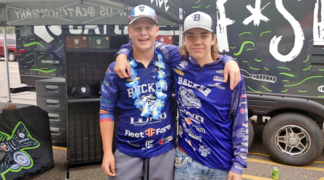 BECKER BASS TEAM MEMBERS Noah and Trevor played bean bag toss before the tournament started. (Photo by Katherine Cantin.)