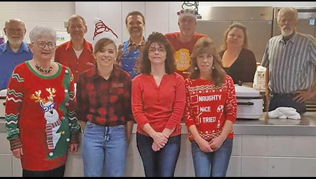CHRISTMAS DINNER IN BECKER. Over 200 people took part in the annual Christmas dinner at Becker Community Center. Thanks to everyone who helped make this day a success. Pictured: John Riebel, Dave Rognlien, Dennis Barutt, Wendy Borst, Ron Simpson, Lou Schutte, Alexis Gunderson, Kim Hudson, Nellie Simpson. (Submitted photo).