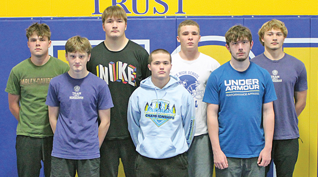 Big Lake 2025 wrestling juniors and seniors. (Front, from left) Grant Volk, Elijah Schaller, Reagan Stenberg, (back) Jack Hess, Hank Kuchera, Austin Frederickson and Liam Mayer. (Photo by Ken Francis.)
