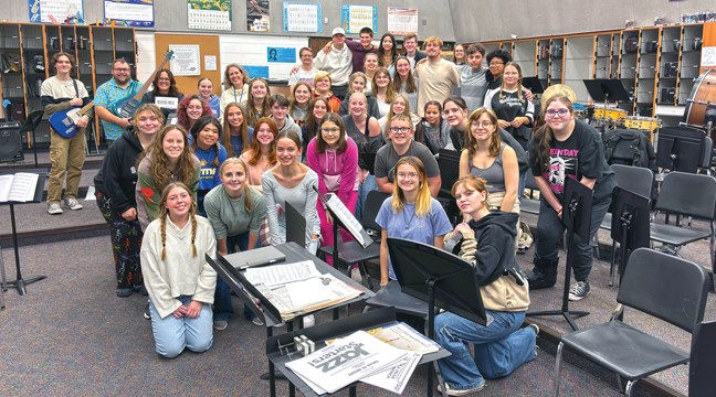 Director Penny Pingrey, Musical Director Gretchen Bordson, and the cast of Mamma Mia! practiced the music for the upcoming musical.  (Patriot photo by Don Bellach)