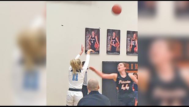 ADELINE KENT drained this shot to capture her 1,000th point of her high school career (she is only a sophomore). (Submitted Photos)