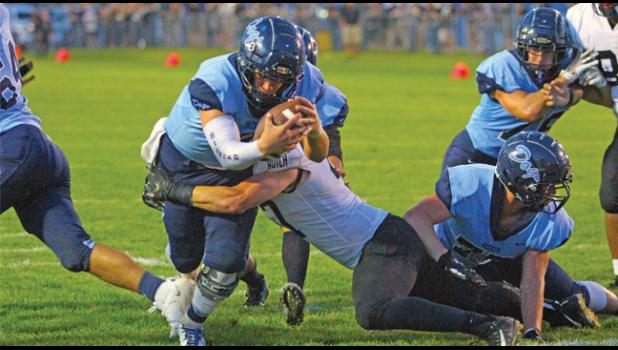 BECKER QB JOSH FOBBE scored Becker’s first touchdown on this dive late in the first half. (Photos by Bill Morgan).