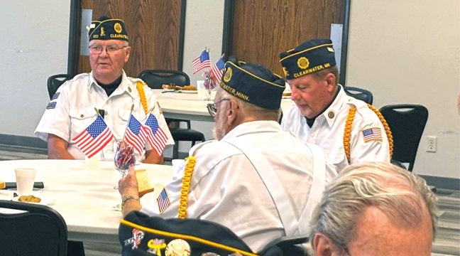 VETERANS gathered for a free meal in appreciation for their service to the country.  (Photo by Penny Leuthard)