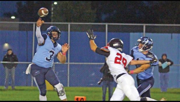 QB JOSH FOBBE looked sharp in the limited times he threw the ball against the Spartans. (Photo by Bill Morgan).