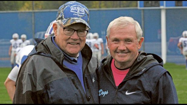 TWO LEGENDS. Dwight (R) poses with Ron Stolski of Brainerd, who is one of two coaches who has more wins than Lundeen. (Photo by Bill Morgan).