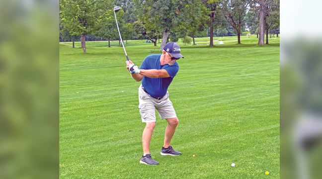 DAVE MORGAN of the Patriot team took a swing during the GRFIA Tournament. (Patriot Photo by Bill Morgan).