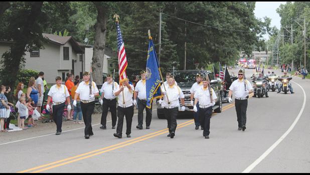 The Clearwater Legion Color Guard led the parade along Main Street, with the Legion Riders right behind.