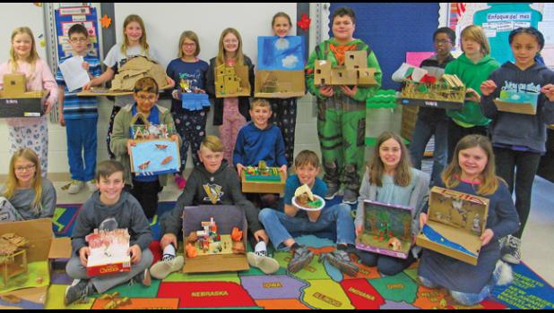 PROFESSORA KARI’S fifth grade students used research and creativity to create dioramas of Native American tribes. (Photo by Penny Leuthard)