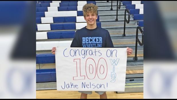 BECKER BULLDOG WRESTLER JAKE NELSON achieved his 100th career win on Feb. 13 during the team’s match against Monticello. (Submitted Photo)
