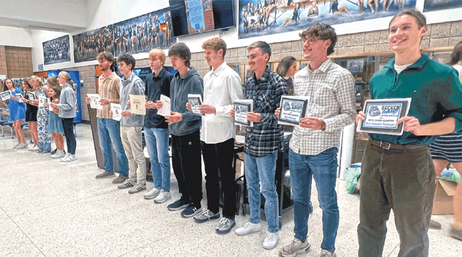 The Becker boys’ and GIrls’ cross country award winners  poses for pictures during awards night. (Submitted Photo).