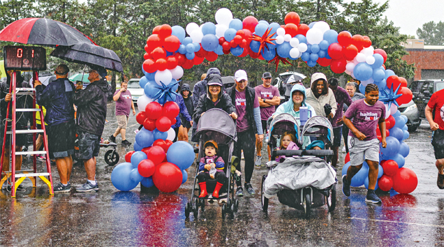 AS THE STARTER BELL RANG hundreds of plucky souls braved the weather last weekend for the 15th Annual Haitian Hustle in Becker. (Submitted Photo).