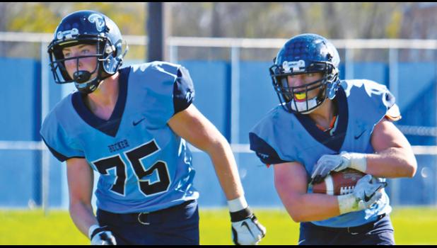 CADEN DEWALL (R) was escorted to the end zone by Brenney Schmidt after DeWall caught an 11-yard pass from Josh Fobbe and scored Becker’s second TD. (Submitted Photos)