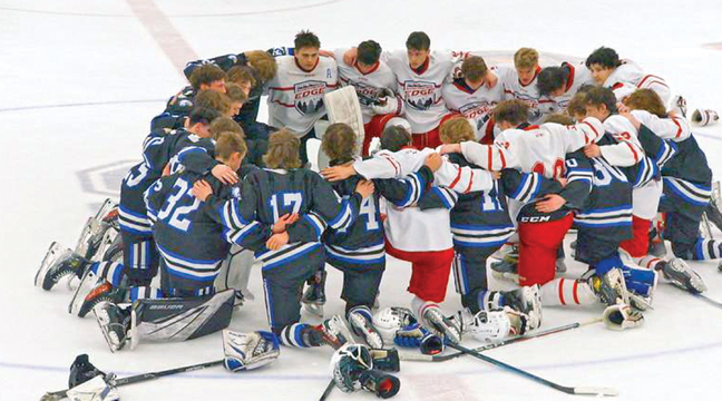 The Becker/Big Lake Eagles gather with The Northern Edge at the end of the game. (Submitted Photo).