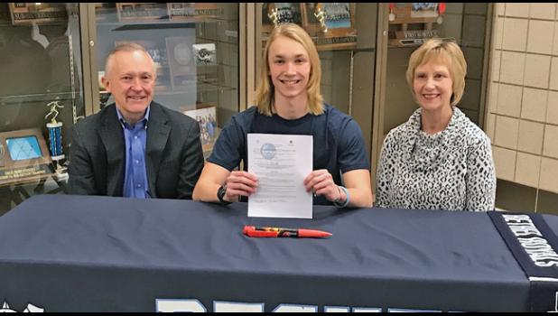 David Myres signed a letter of intent to compete in men’s track and field at Bethel University next year. The signing took place in the high school commons Tuesday. David is shown with his parents, Brian and Carla Myres. (Submitted Photo)
