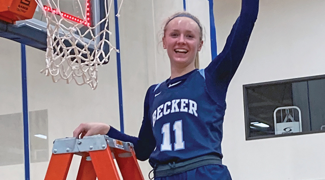 Becker’s Adeline Kent was all smiles after cutting down her portion of the net after the Bulldogs secured a trip to the Class AAA State Tournament (submitted photo).