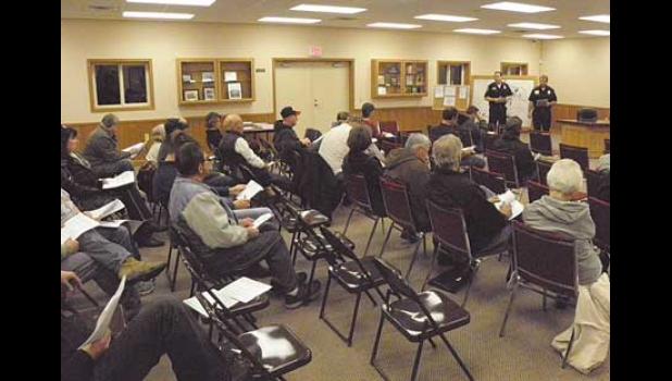 About 24 Clearwater Twp. residents attended Tuesday’s annual meeting to vote on the 2018 levy. Above, they listen to a budget report by members of Clearwater Fire & Resuce.