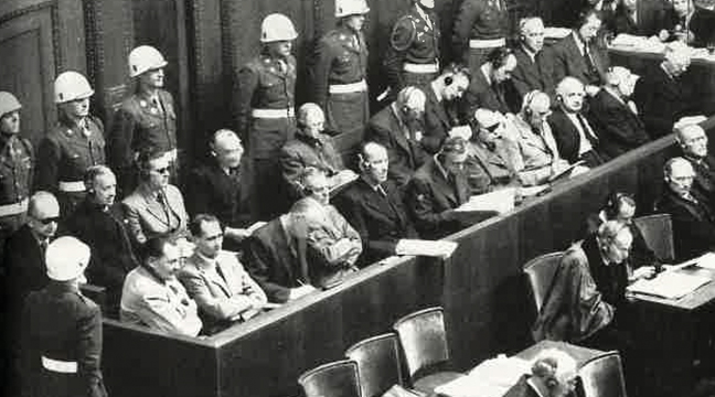 SOME OF THE MEMBERS of the Nuremburg trial docket, seated front and second rows, from left, Goring, Hess, von Ribbontrop and Frick. (Submitted Photo).