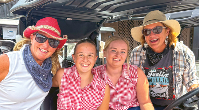 THE GIDDY UP GIRLS captured first place in the Becker Chamber Wild West Golf Tournament. The team consisted of Jen Fingarson, Sydney Dunderi, Layla Mathews and Stacey Vetsch. (Submitted Photo).