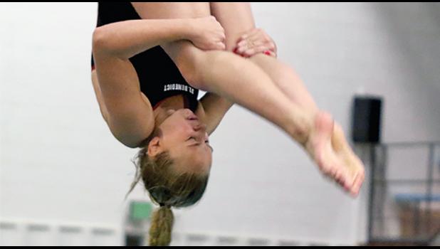 EMI QUILL OF BECKER contiuned her dominance on the diving board as she swept her one and three-meter competitions at St. Kate’s last week. (Submitted Photo).