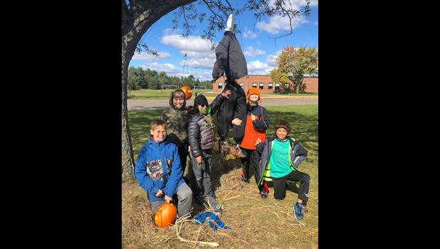 James M., Oliver S., Evan K., Marcus W. and Isaac S. made use of pumpkins to complete their scarecrow theme. 