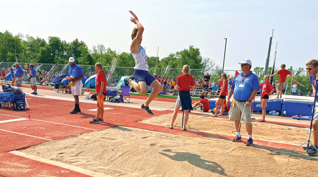 Carter Reckelberg won the state title in the long jump and also set the new state Class AA record with his leap of 23’3”. (Submitted Photo.)  